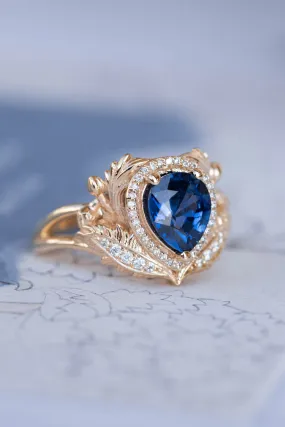 Dark blue sapphire engagement ring, gold ring with diamond halo / Adonis halo