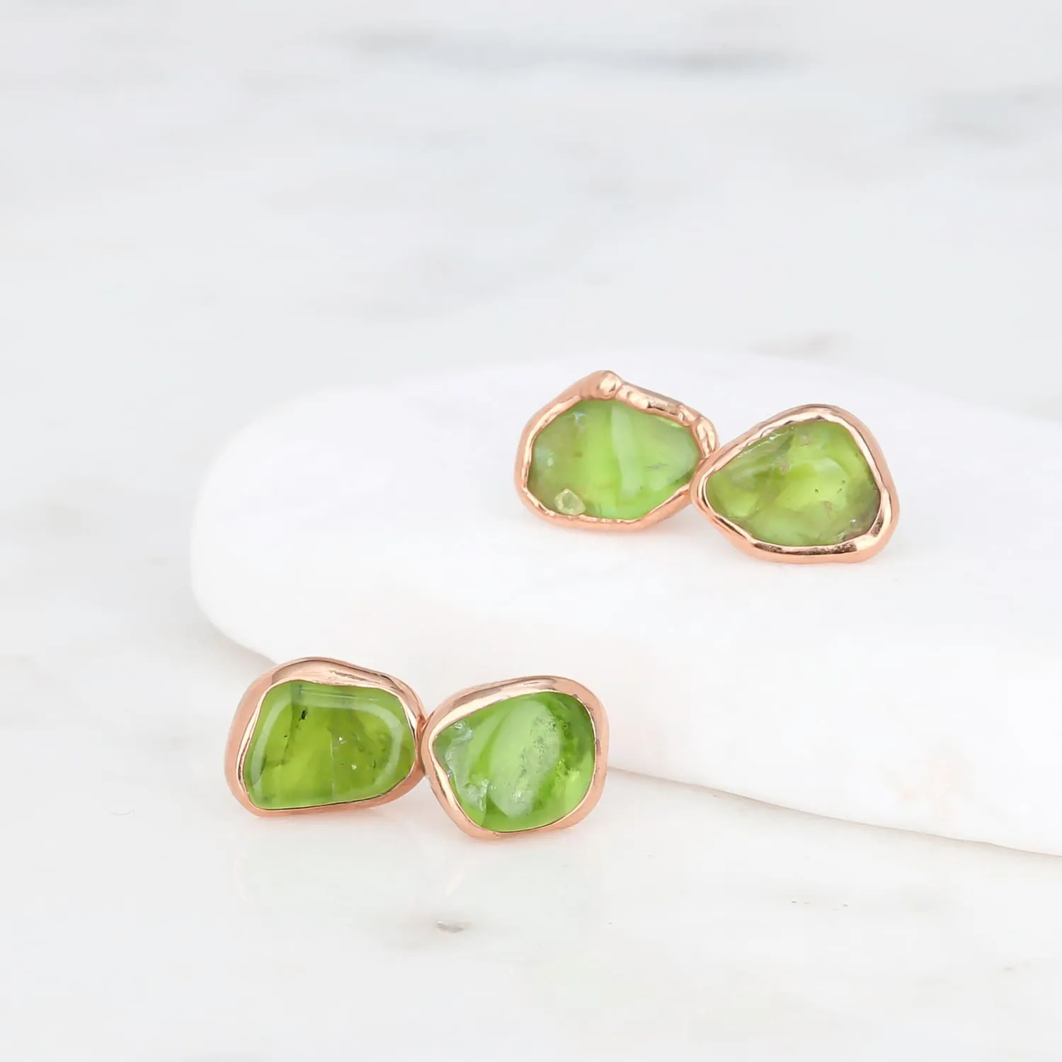 Raw Peridot Stud Earrings in Rose Gold